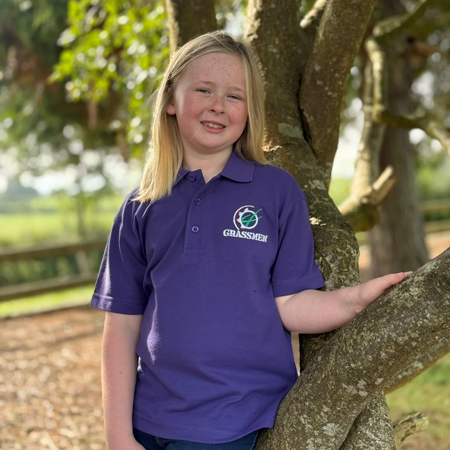 "GRASSMEN" Kids Purple Polo Shirt - Image 5